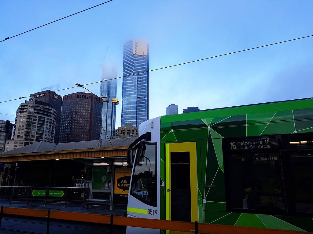 City of Melbourne tram with Eureka Tower in the clouds